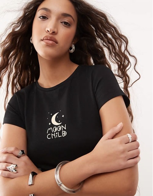 baby tee with moon child graphic in black