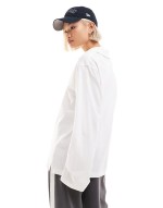 Toby oversized long sve polo top in white