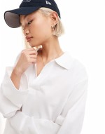Toby oversized long sve polo top in white