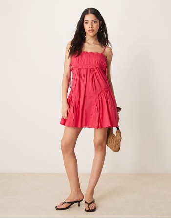 babydoll mini dress with ruffle hem in raspberry