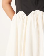 contrast drop hem mini dress in monochrome