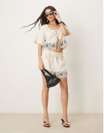 embroidered tie top and hem shorts co-ord in natural